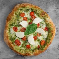 L'Italiana Pizza · Ricotta and pesto blend, fresh tomatoes, and mozzarella. Topped with fresh mozzarella and ba...