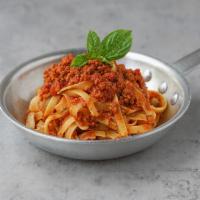Fettuccine Bolognese · Fettuccine with all-natural beef and tomato sauce.