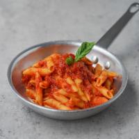 Penne Pummarola · Penne with San Marzano tomato sauce.