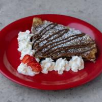 Nutella Crepe · A warm, fluffy crepe filled with Nutella.