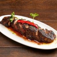 Bistek A La Plancha. · Seared Beef Steak a la Plancha