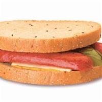 Polish Sandwich · A spicy Polish sausage is split and placed between 2 slices of warm rye bread, then topped w...