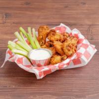 Buffalo Wings · Served with Bleu Cheese & Celery