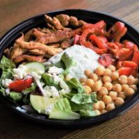 Mediterranean Chicken Bowl · Marinated chicken, Romaine, red onion, tomato, cucumber, Feta, Roasted peppers, and chickpea...