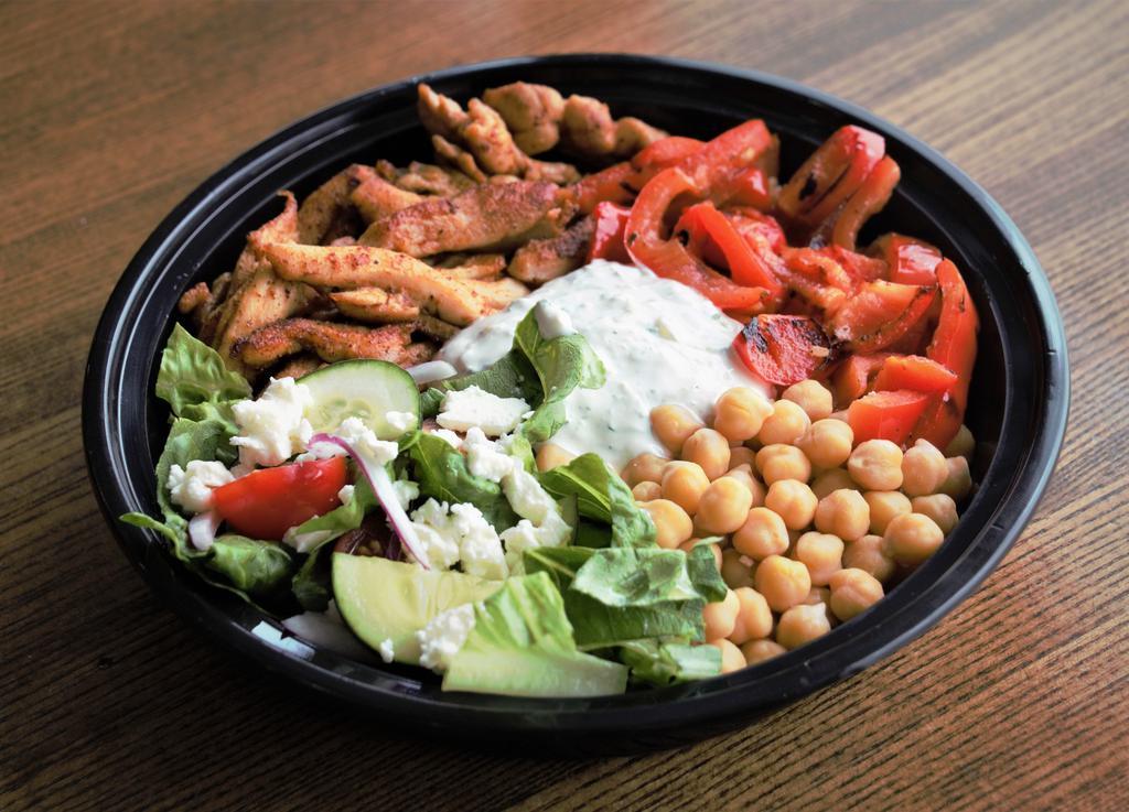 Mediterranean Chicken Bowl · Marinated chicken, Romaine, red onion, tomato, cucumber, Feta, Roasted peppers, and chickpeas over rice and homemade Tzatziki sauce.