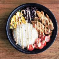 Southwest chicken bowl · Blackened chicken, corn salsa, black beans, fresh salsa and romaine over rice drizzled with ...