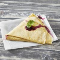 Wild Berry Cheesecake Crepe · Blueberry, raspberry, blackberry coulis and cheesecake filling.