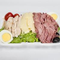 The B.B. Salad · Crisp lettuce mix topped with corned beef, turkey, Swiss cheese, hard boiled egg, and choice...