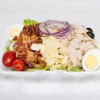 Cobb Salad · Crisp lettuce mix topped with turkey, bacon, red onion, swiss cheese, hard boiled egg and bl...