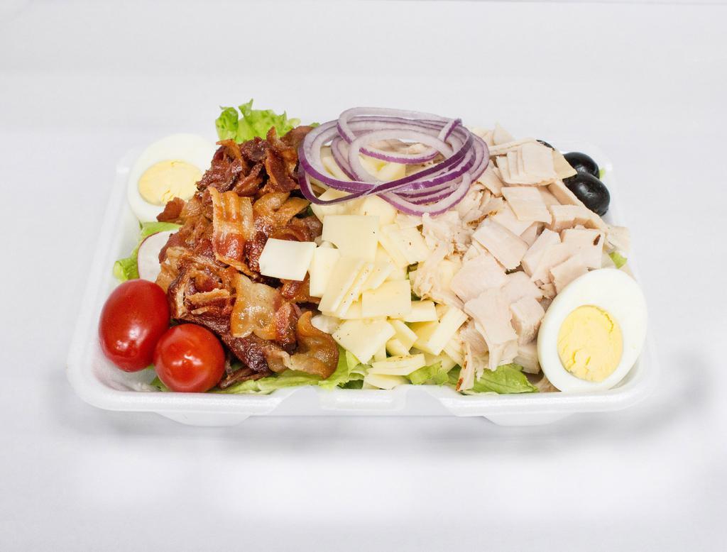 Cobb Salad · Crisp lettuce mix topped with turkey, bacon, red onion, swiss cheese, hard boiled egg and bleu cheese dressing.