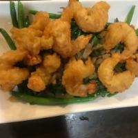 D8. Salt and Pepper Shrimp · Diced bell peppers, diced onions, jumbo shrimp, salt and green pepper and seasoning served w...