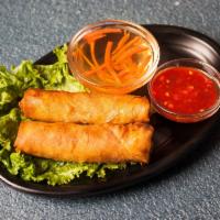 Vegetarian Egg Roll · Deep fried rolls filled with tofu, noodles, onion, carrot and taro. Served with fish sauce. ...