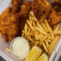 Fish and Chips · Beer-battered seafood served with fries and coleslaw only.