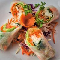 Shrimp Spring Rolls · 2 pieces. Shrimp, bean sprouts, lettuce, carrots, and rice noodles wrapped in rice paper. Se...