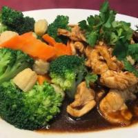 Fried Garlic · Meat of your choice (or tofu) with sautéed broccoli, baby corns, carrots in Thai peppers and...