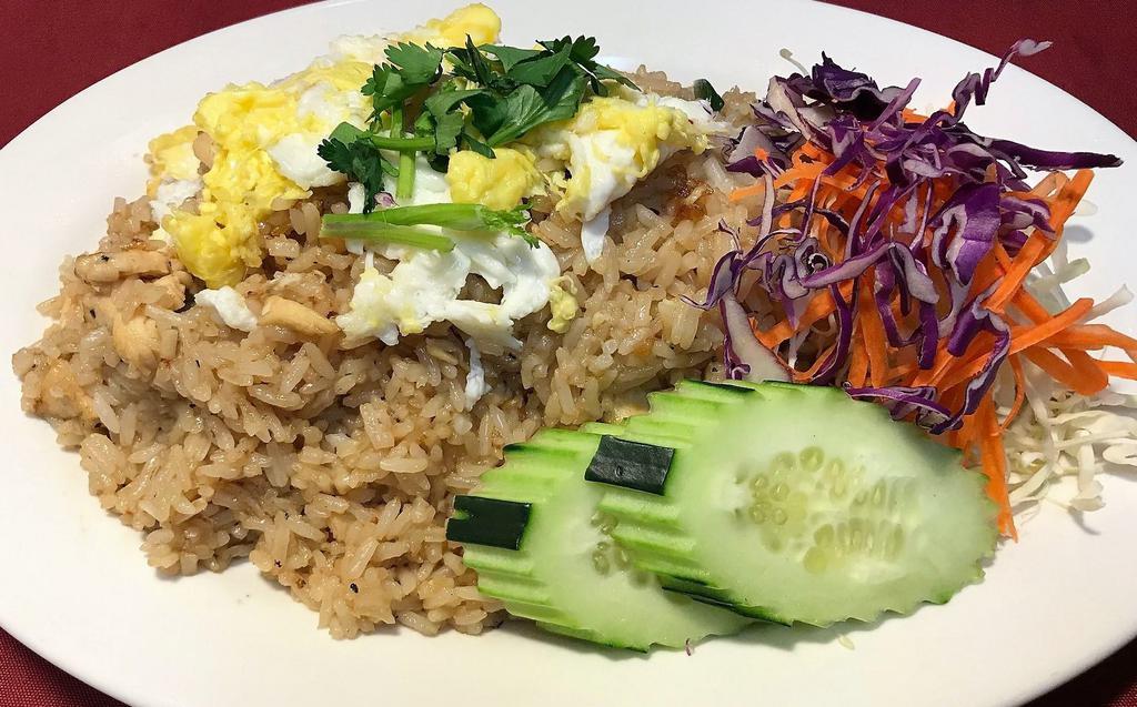 Thai Fried Rice · Wok-fried rice with green onions, eggs, and tomatoes. Meat of your choice (or tofu).