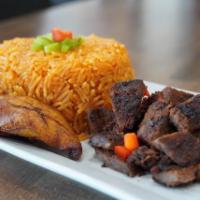 Jollof Rice and Beef Suya · Rice mixed with red tomato sauce and onions and premium beef steak seasoned with suya spice.