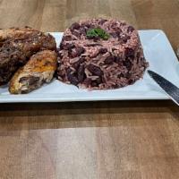 Rice + Peas + Jerk Chicken · Caribbean styled rice cooked with peas + grilled jerk chicken wings.