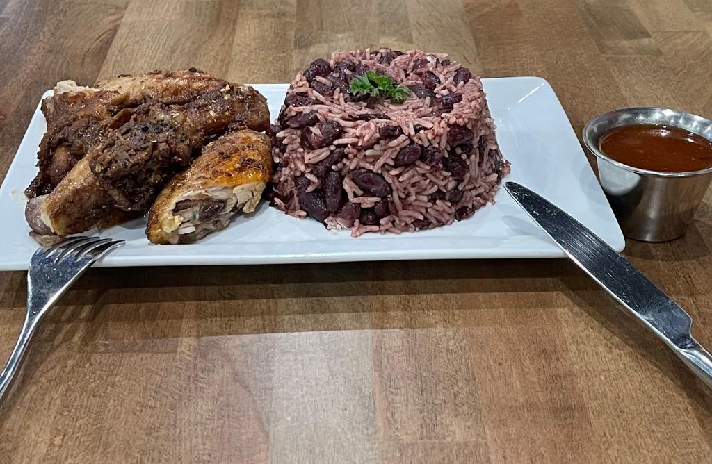 Rice + Peas + Jerk Chicken · Caribbean styled rice cooked with peas + grilled jerk chicken wings.