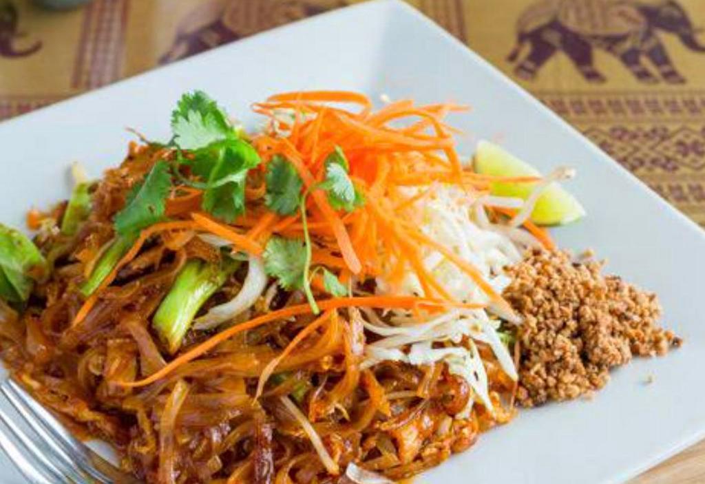 N1. Pad Thai · Thin rice noodles stir-fried with egg green onions, bean sprouts, and special pad Thai sauce topped with grounded peanuts.