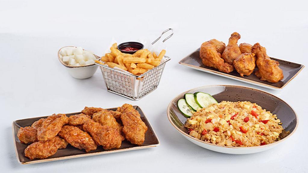 Family Meal · The Family Meal comes with 12 wings, 6 Drums, 2 sides and a Plain Fried Rice. Your side options are Coleslaw, Radish and Regular Fries. You can swap the Wings for the Boneless Wings.