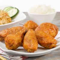 Fried Chicken Wings · Served with your choice of spicy, soy garlic or half spicy and half soy garlic sauce. Served...