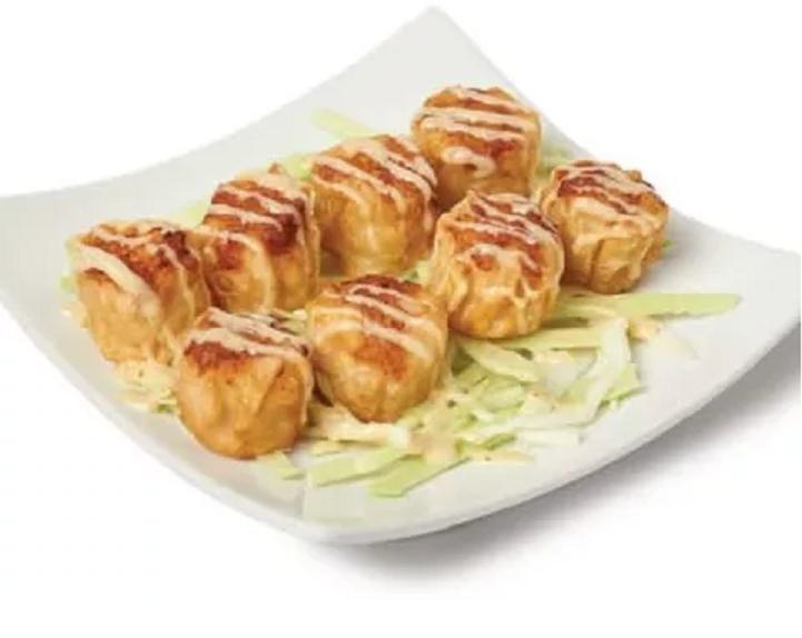 Shrimp Shumai (8 pcs) · Shrimp dumplings drizzled with honey Dijon dressing.