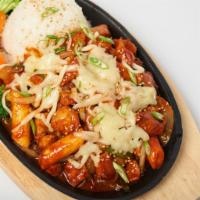 Bull Dak · Spicy chicken stir-fried with rice cakes and Bonchon signature hot sauce, sauteed onions, to...