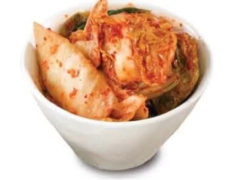 Kimchi · Kimchi is a national Korean dish consisting of fermented chili peppers on cabbage. Pescatarian.