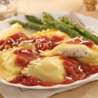 Baked Cheese Ravioli · Served with tomato sauce and melted mozzarella.