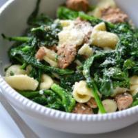 Penne with Sausage and Broccoli Rabe · White wine, garlic, and olive oil.