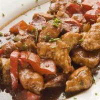 Chicken Scarpariello · Filet of chicken sauteed with sweet Italian sausage and hot cherry peppers in a garlic olive...
