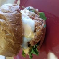 Fried Chicken Sandwich · buttermilk fried chicken breast, swiss cheese, organic greens, sweet chili sauce. pickles an...