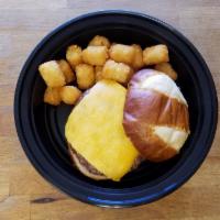 Kids Cheeseburger · beef, cheddar on a brioche bun. Served with a side