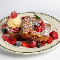 Mixed Berry French Toast · Takes 20 mins! Danish bread French toast topped with fresh mixed berry, whipped cream, and v...