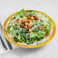 Caesar Salad · Crisp romaine, croutons, and grated cheese.