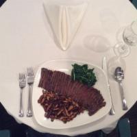 London Broil Steak Marinated in Ginger & Teriyaki · Sauteed shitake mushrooms & spinach.