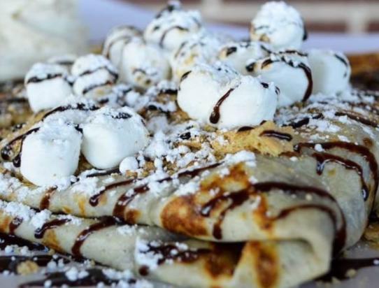 S'mores Crepe · Marshmallows, Russian tea cookies, and Nutella fill this crepe.