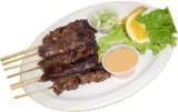 Sate · Marinated sliced beef or chicken in a mixture of Thai spices and coconut milk grilled and se...