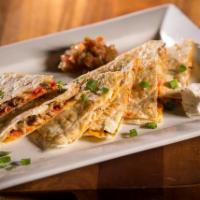 Roasted Chicken Quesadilla · Diced tomatoes, pepper jack and cheddar cheese in a flour tortilla served with sour cream an...