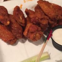 Buffalo Wings · 10 wings. Comes with celery and bleu cheese dressing. Choice of 1 sauce for every 10 wings.
