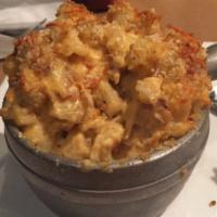 Classic Mac and Cheese · Baked with cheddar and monterey jack cheese bread crumbs.