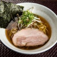 Shoyu Ramen · Soy sauce based broth. Original Japanese style and clear brown soup Thai is savory.