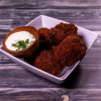 Boudin Balls · Jalapeno boudin breaded and served with remoulade.