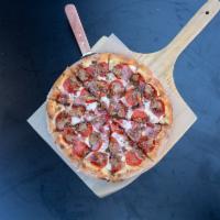 Meat Lovers Pizza · Pepperoni, ham, bacon, ground beef, and Italian sausage.