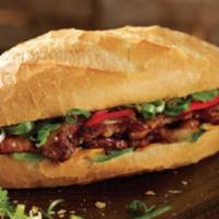 Traditional Banh Mi Sandwich · Vietnamese ham and cold cuts.  Served in a toasted French baguette served with pate, mayo, p...