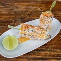 Elote · Grilled corn on the cob, chipotle mayo, cotija cheese, lime and morita salt.
