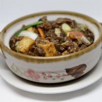 AC6. Beef Stew in Hot Pot Combo · Chinese style beef stew with fried bean cake, fresh bean curd, Chinese mushrooms and vegetab...