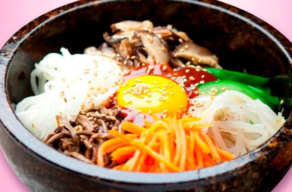 Dol Sot Bi-Bim-Bap · Our signature hot stone rice bowl served at 500 C, seasonal vegetables, overeasy egg, steamed rice and your choice of protein.