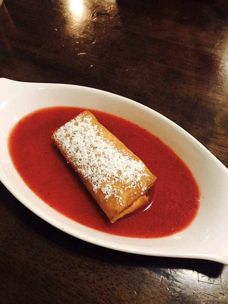 Fried Cheesecake with Strawberry Sauce · Our innovative take on cheesecake. 